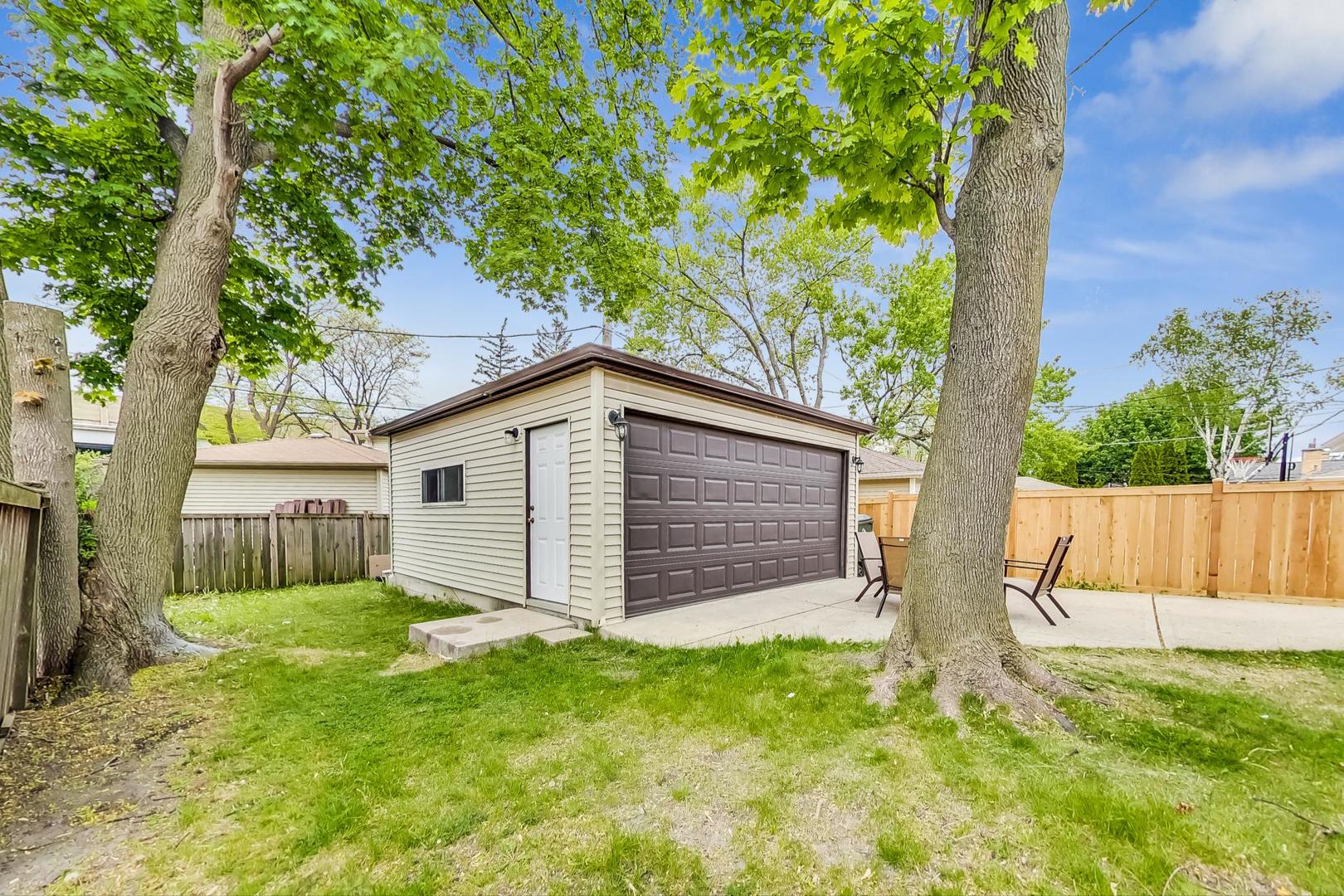 1218 Elliott Street Park Ridge, IL 60068 - Photo 21 of 24 a view of a house with a yard
