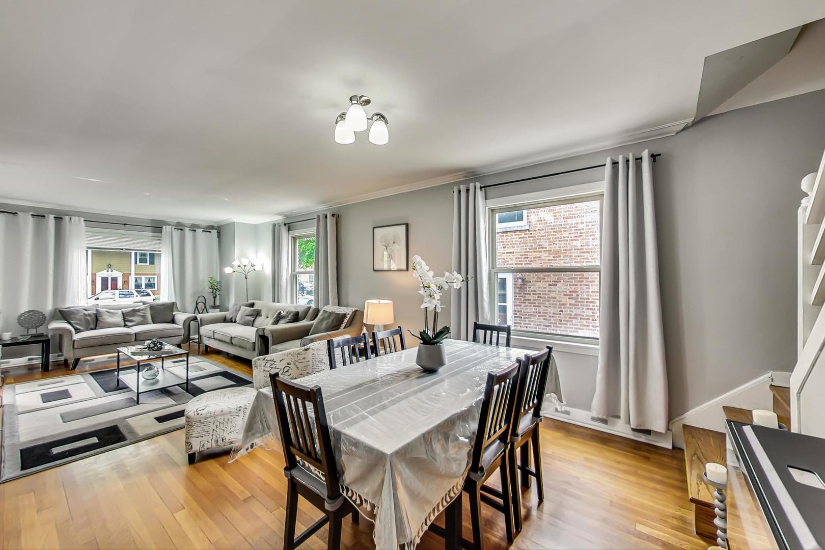 1218 Elliott Street Park Ridge, IL 60068 - Photo 7 of 24 a view of a dining room with furniture window and wooden floor