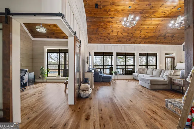 a bathroom with a granite countertop toilet sink and a mirror