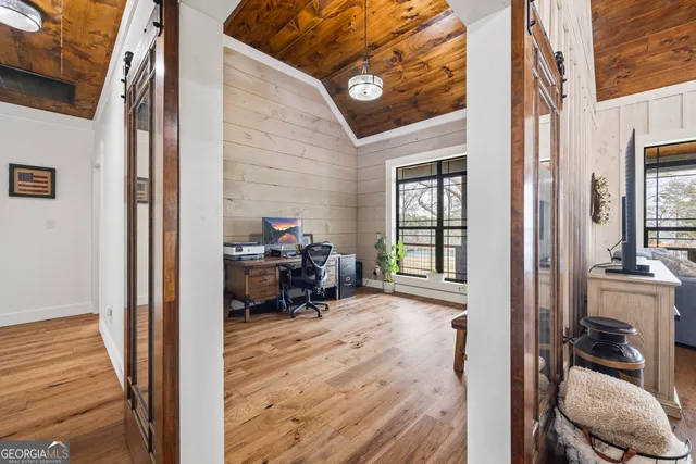 a view of entryway with wooden floor