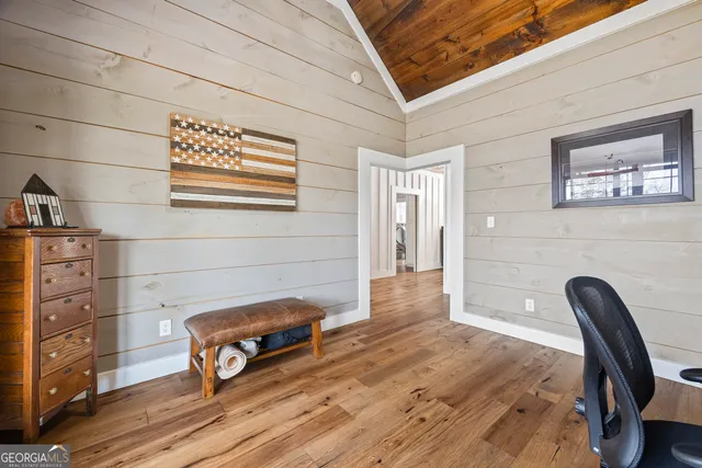 a bathroom with a toilet a sink and a window