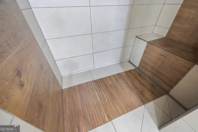 a view of a swimming pool with an outdoor seating