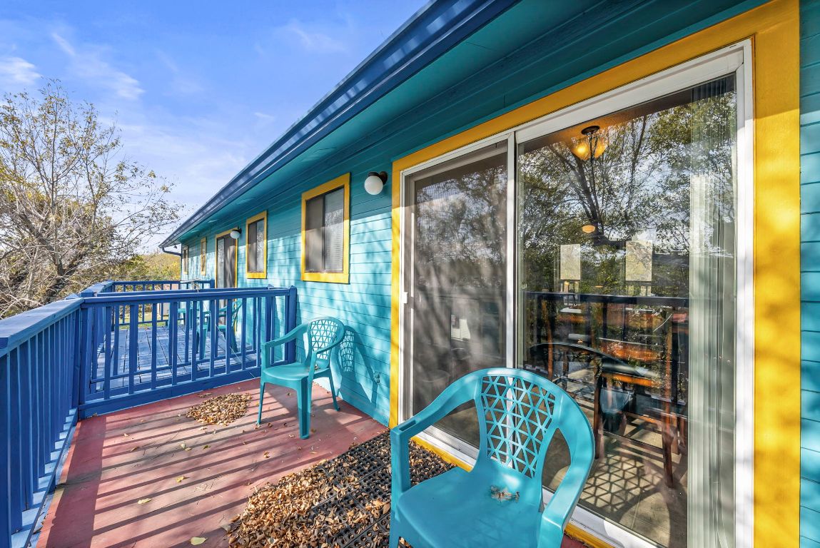 202 West Wheeler Street Manor, TX 78653 - Photo 8 of 28 a balcony with chairs and a table