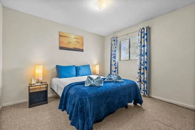 a dining room with a table and chairs