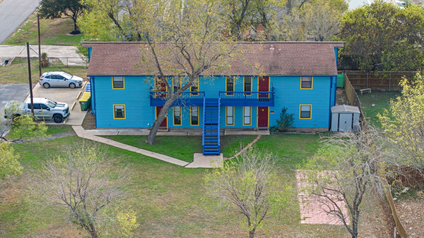 202 West Wheeler Street Manor, TX 78653 - Photo 23 of 28 a view of a house with a yard