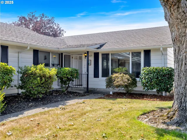 front view of a house with a yard