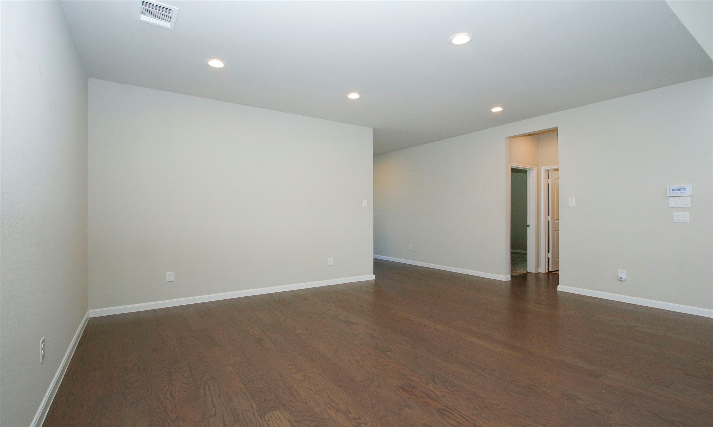 14120 Sand Ridge Court Conroe, TX 77384 - Photo 12 of 43 an empty room with wooden floor and closet