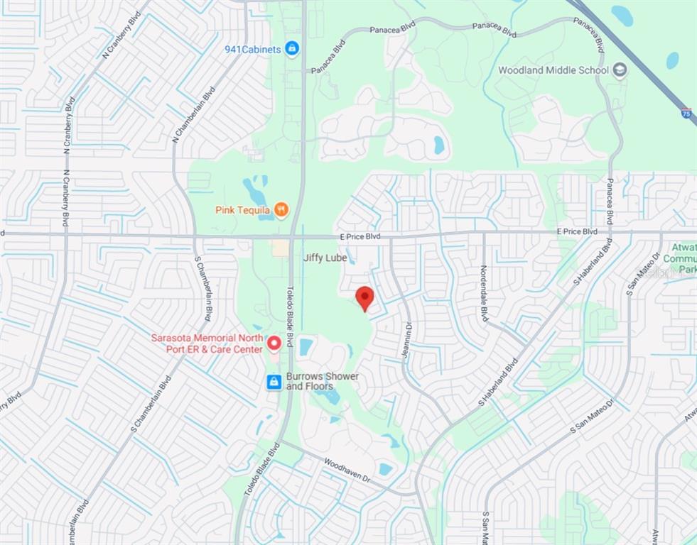 29 Gourmet Road North Port, FL 34288 - Photo 7 of 9 a picture of a room with a white comforter and a window