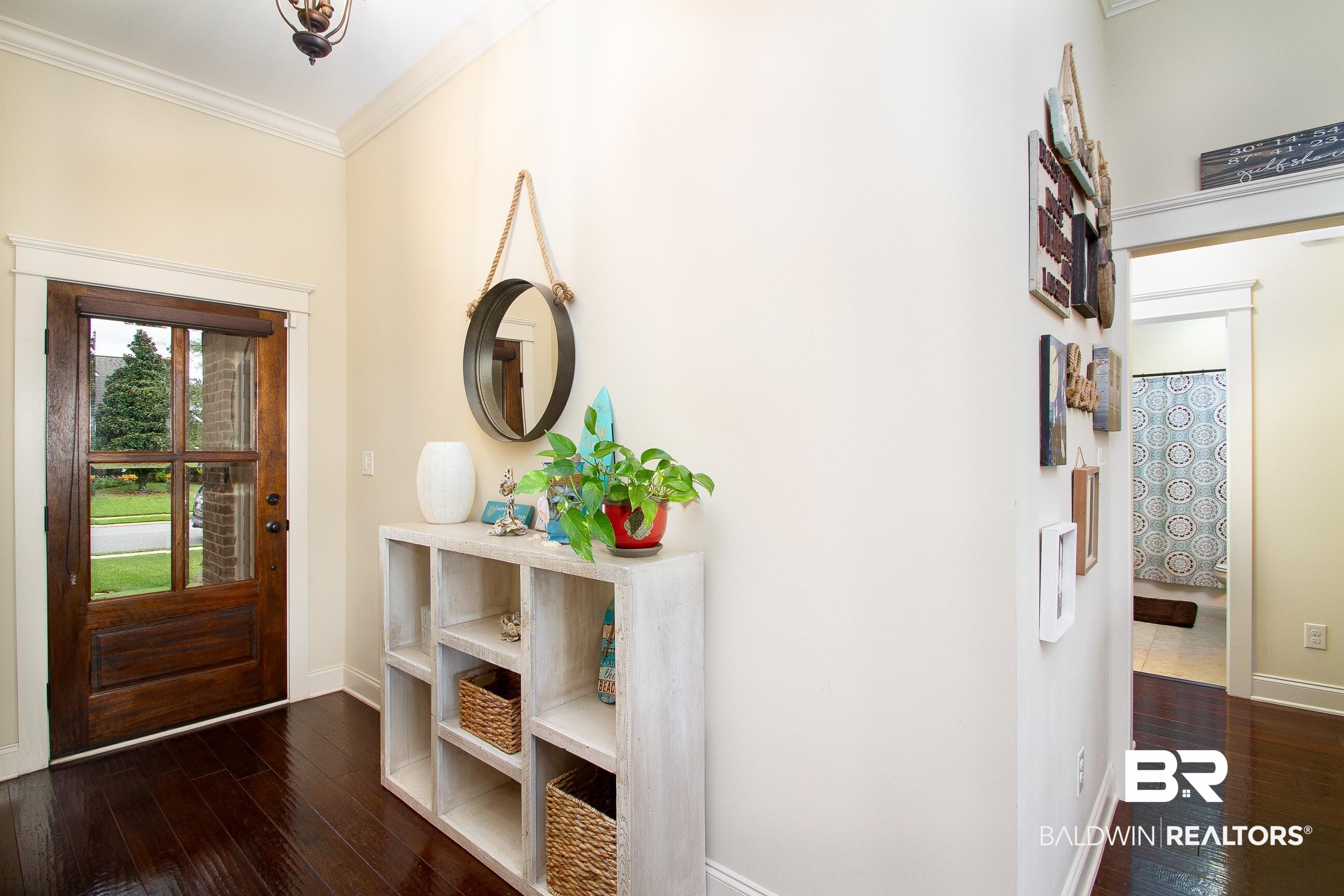 8625 Rosedown Lane Daphne, AL 36526 - Photo 4 of 29 Foyer featuring ornamental molding and dark wood-type flooring