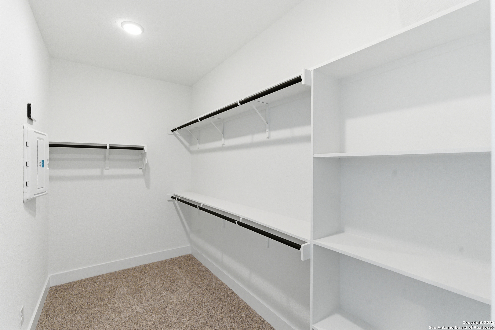 6464 Babcock Road, Unit 717 San Antonio, TX 78249 - Photo 32 of 44 a view of an empty walk in closet