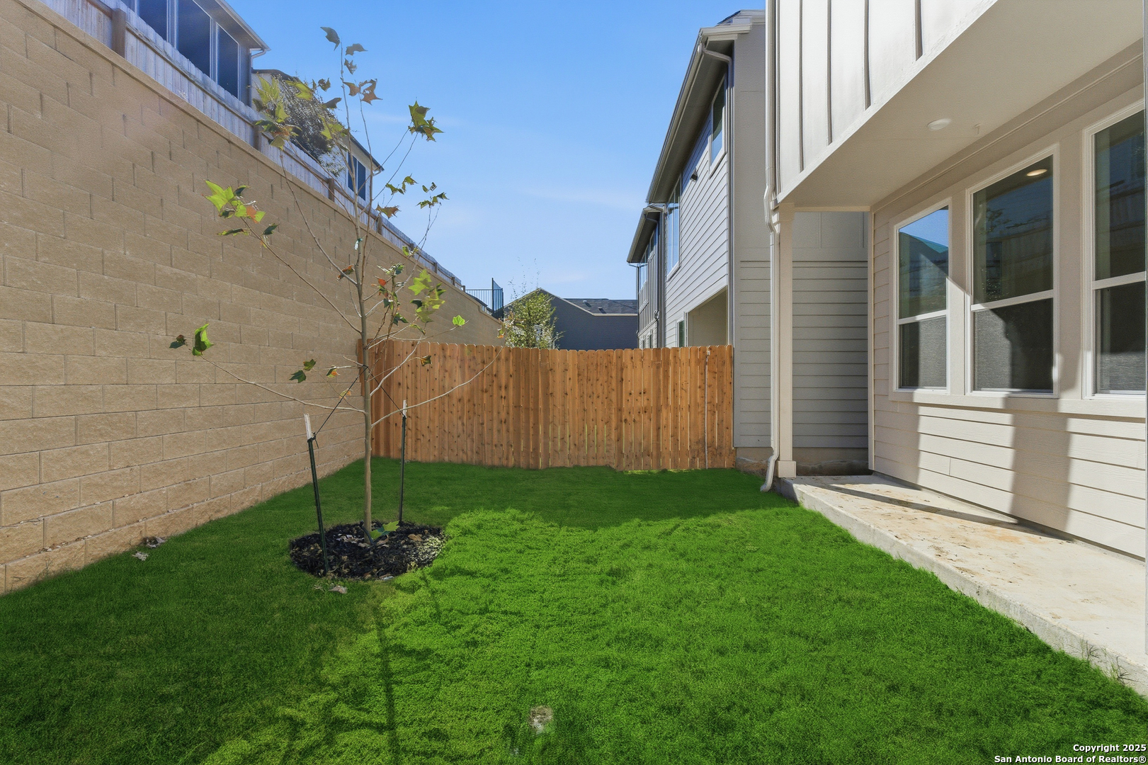 6464 Babcock Road, Unit 717 San Antonio, TX 78249 - Photo 37 of 44 a house view with a garden space