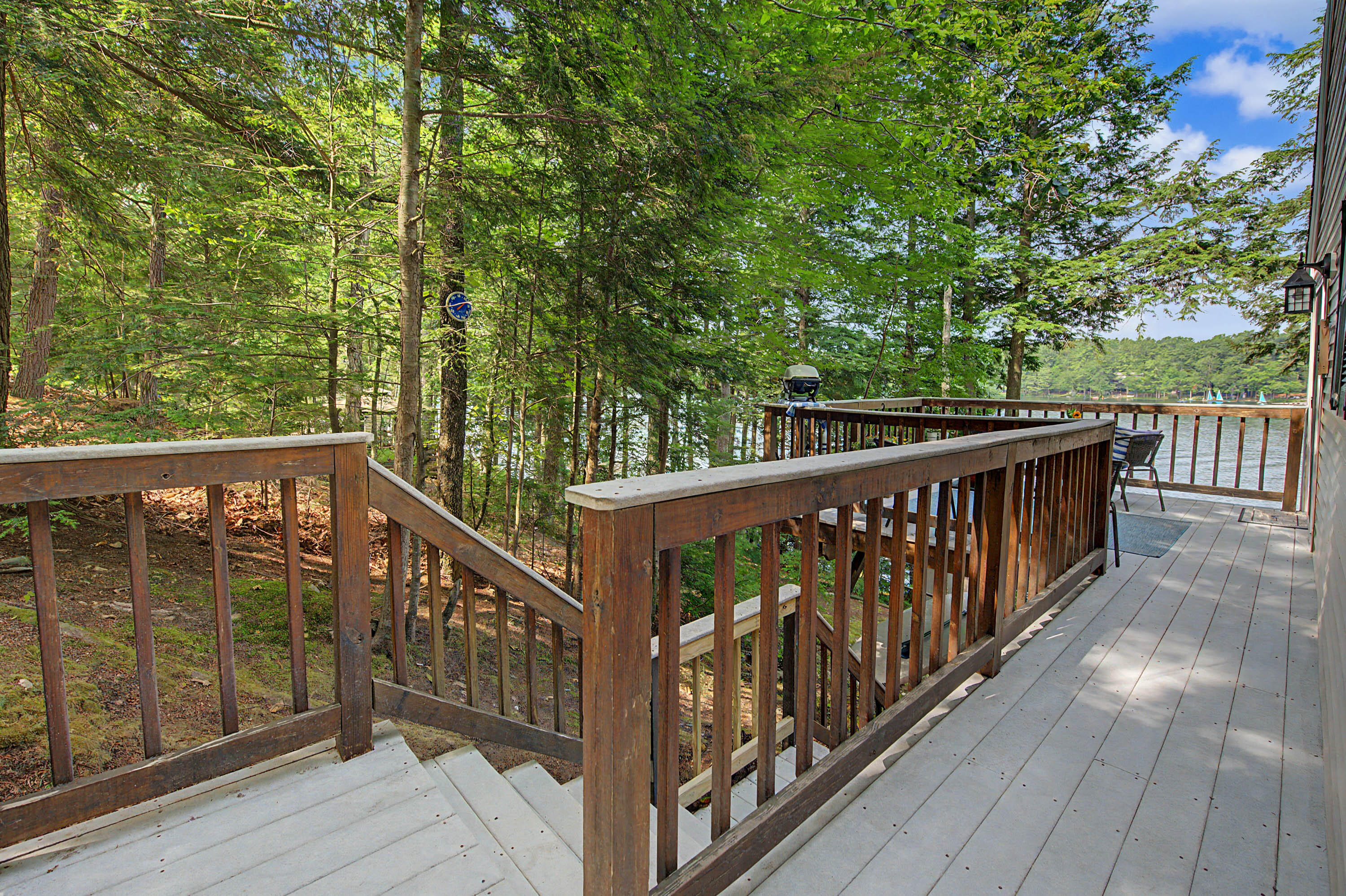 137 Coffee Pond Road Casco, ME 04015 - Photo 13 of 20 Stairs from deck to yard and water front