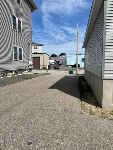 a bed room with furniture and gym equipment