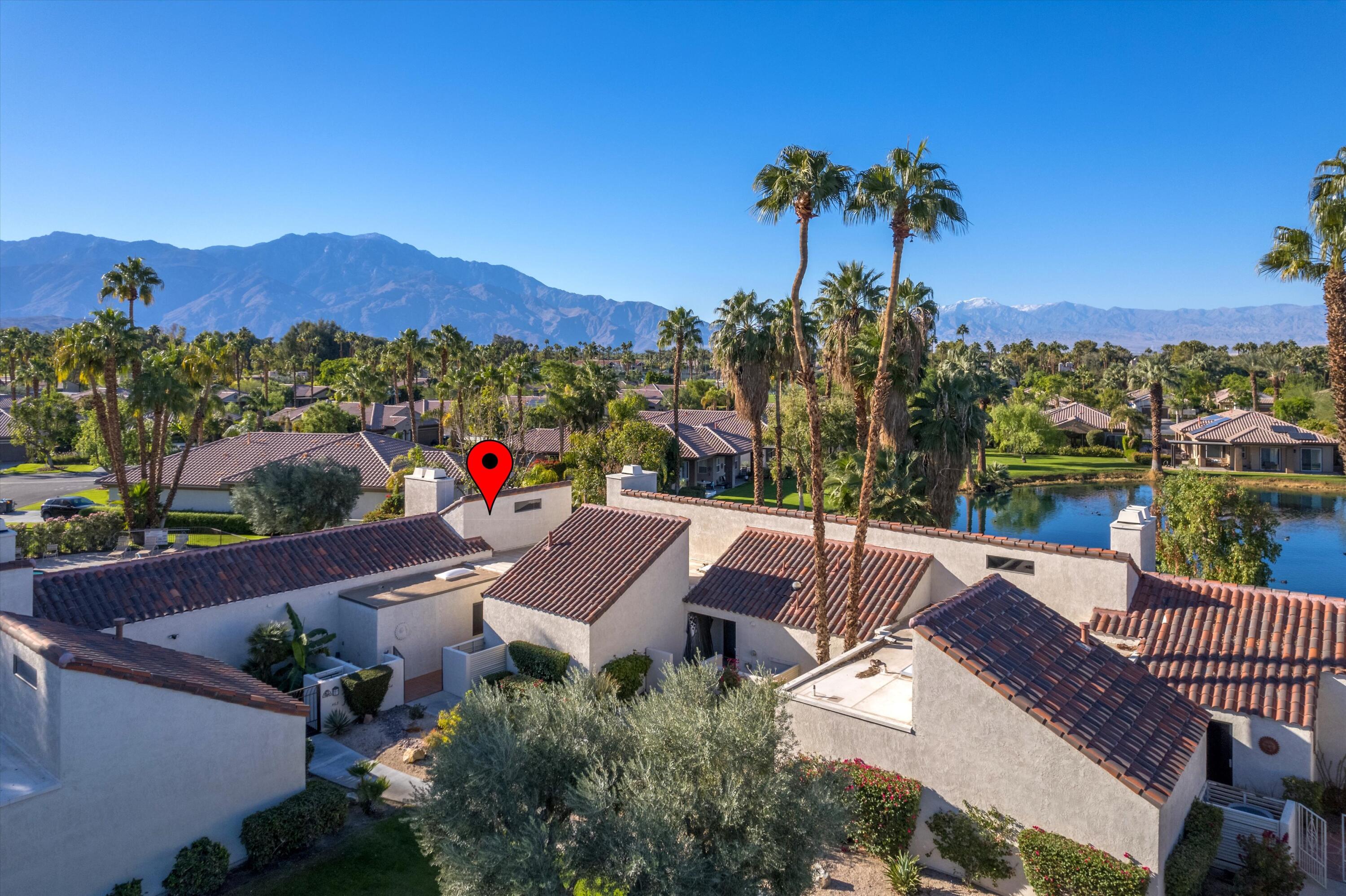 464 Sunningdale Drive Rancho Mirage, CA 92270 - Photo 2 of 47 a view of a patio with a table and chairs