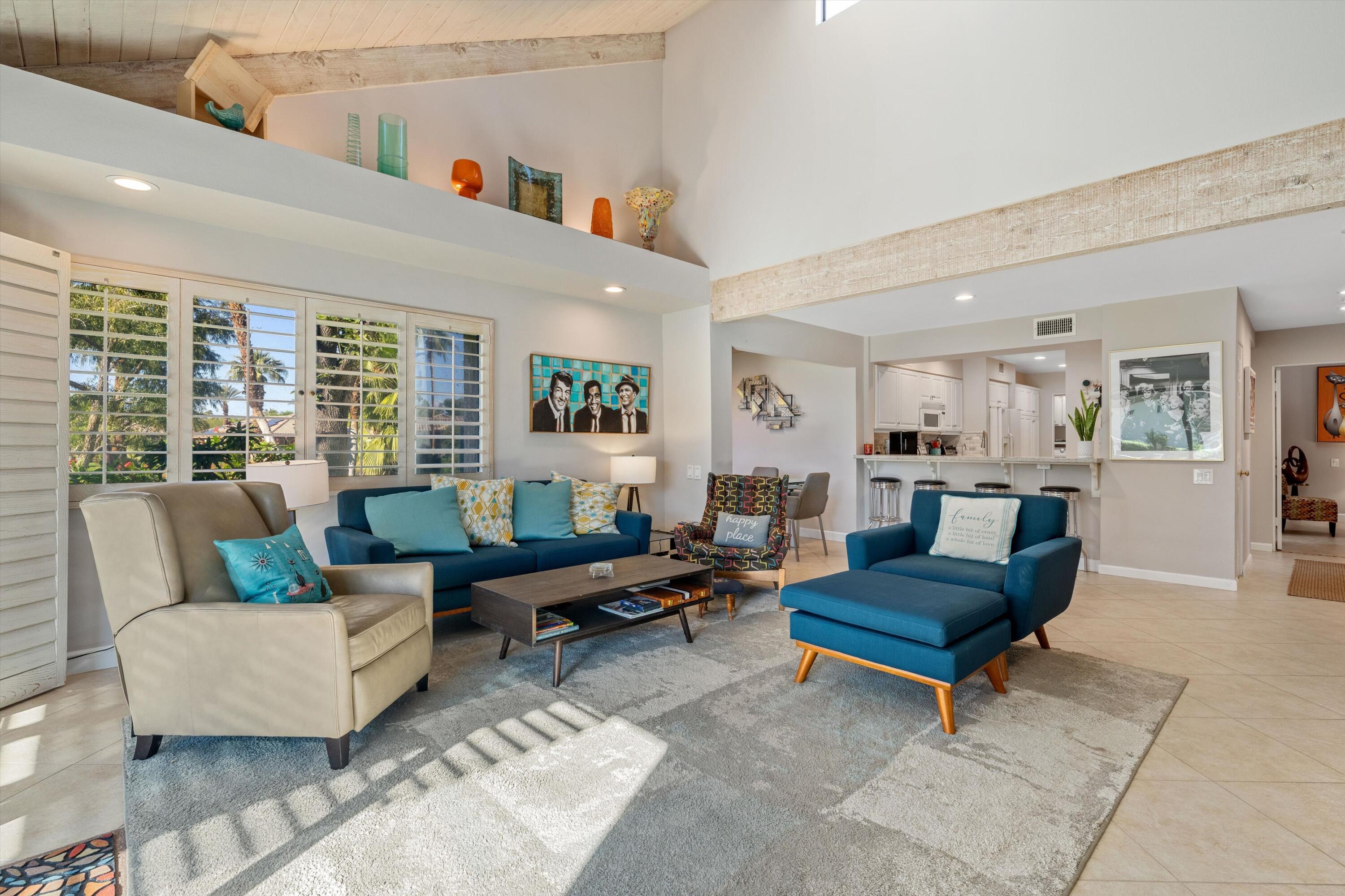 464 Sunningdale Drive Rancho Mirage, CA 92270 - Photo 26 of 47 a living room with furniture and a rug