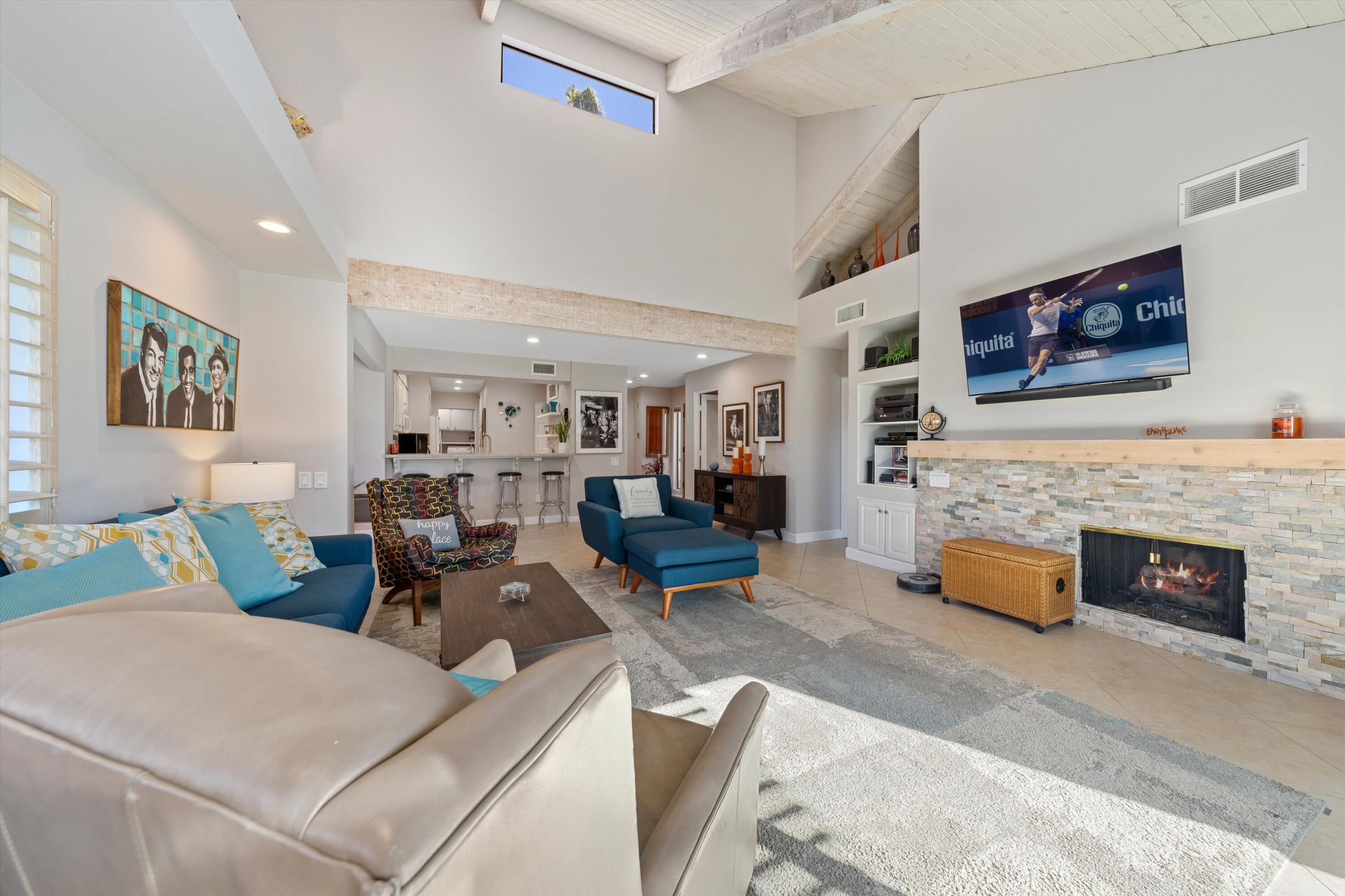 464 Sunningdale Drive Rancho Mirage, CA 92270 - Photo 27 of 47 a living room with furniture and fireplace