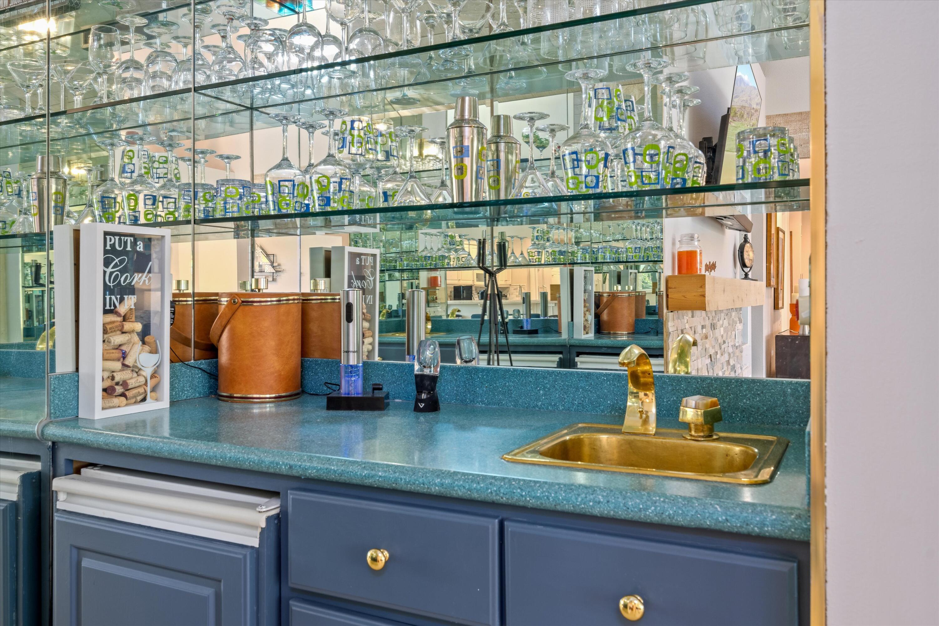 464 Sunningdale Drive Rancho Mirage, CA 92270 - Photo 28 of 47 a kitchen with a sink and a large window