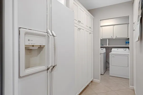 a bathroom with a shower sink and mirror