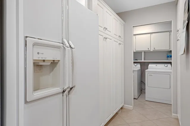 a bathroom with a shower sink and mirror