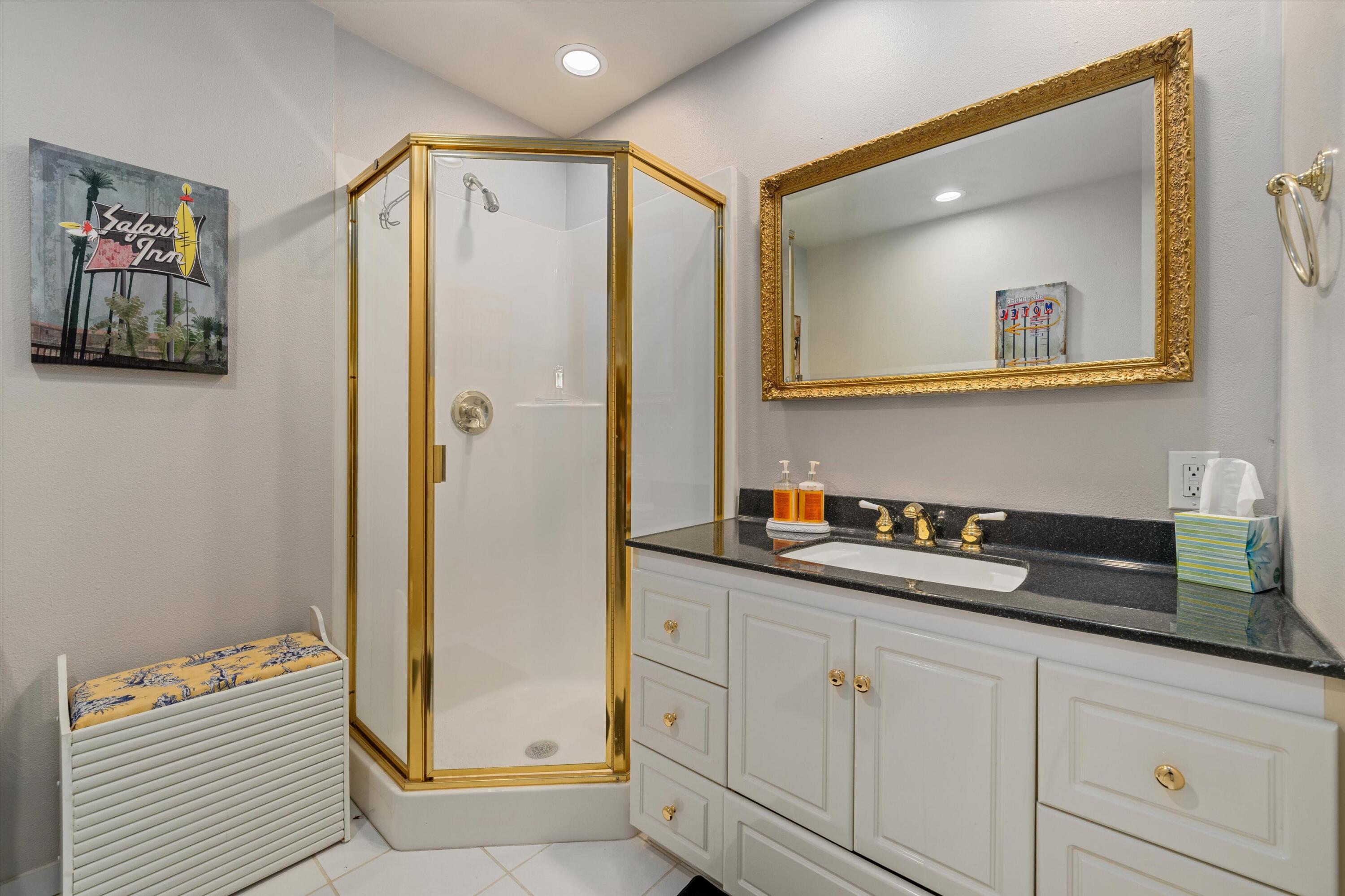 464 Sunningdale Drive Rancho Mirage, CA 92270 - Photo 44 of 47 a bathroom with a sink a mirror a vanity and shower
