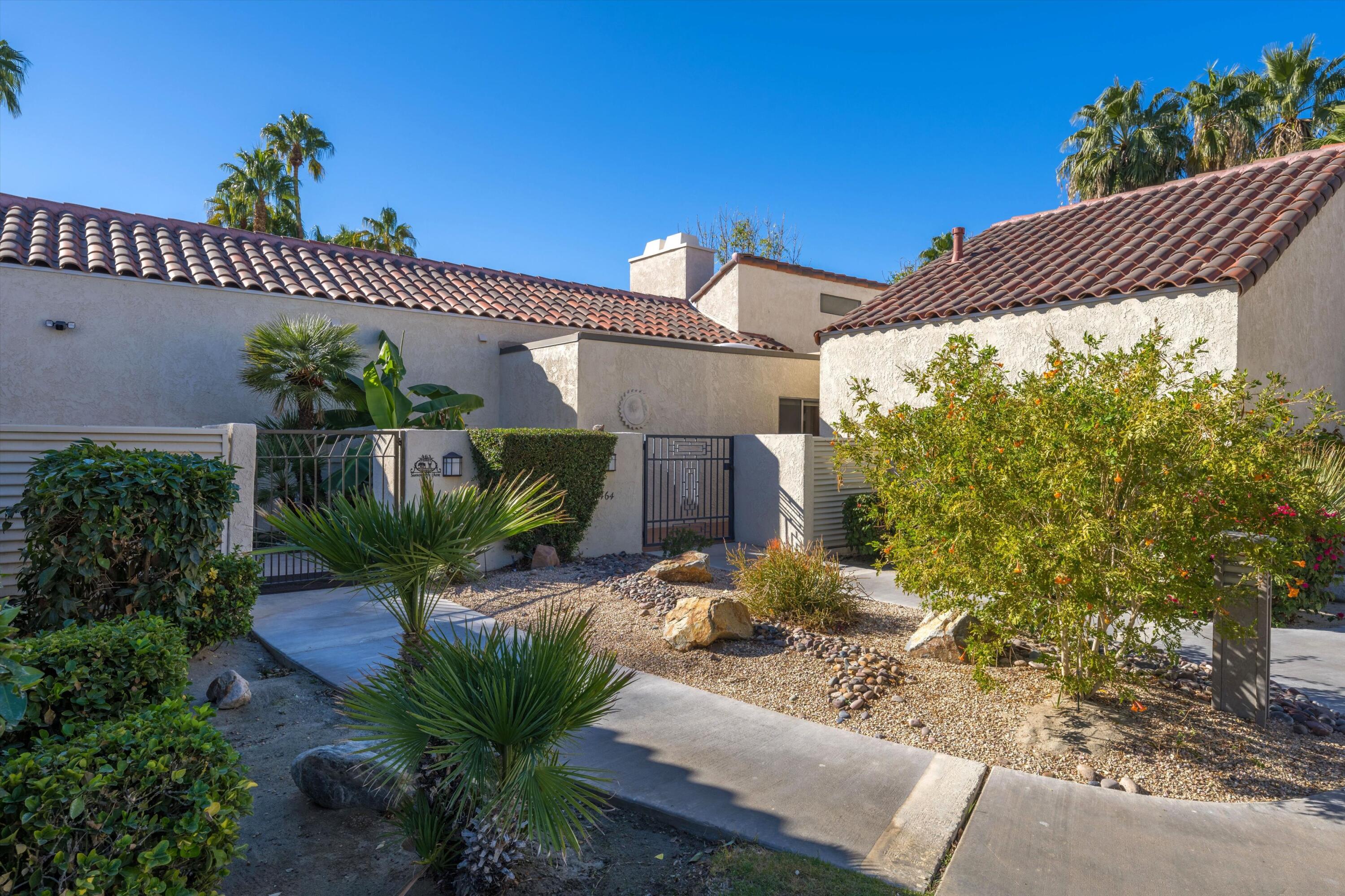464 Sunningdale Drive Rancho Mirage, CA 92270 - Photo 9 of 47 a house with lots of trees in front of it