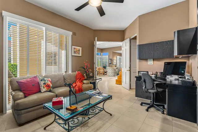 a kitchen with a sink a stove and a refrigerator