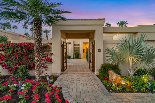 a view of a building with a yard