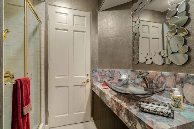 a view of a table and chairs in patio with a yard