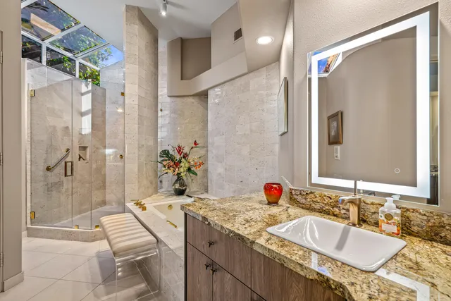 a view of a park with a palm trees