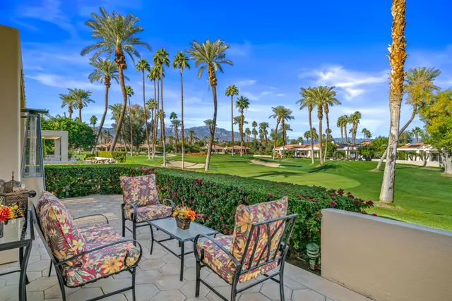 a outdoor dining space with furniture and outdoor view