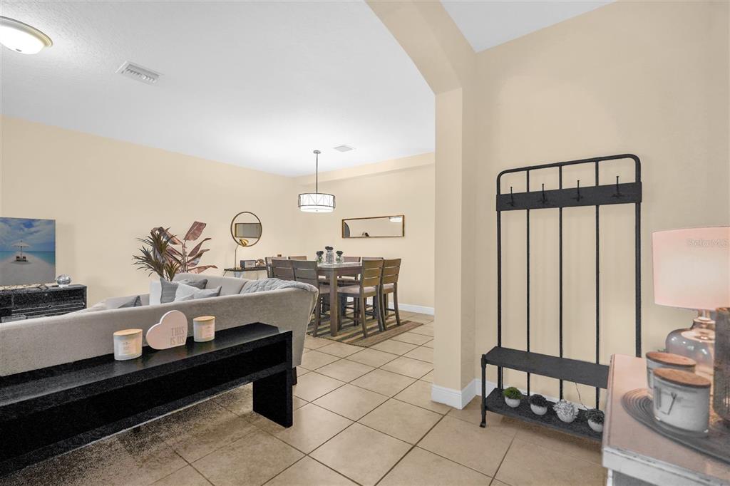 12353 Via Derna Place Windermere, FL 34786 - Photo 6 of 26 a living room with furniture