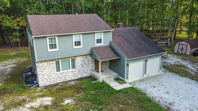 a house view with a garden space