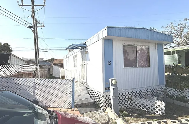 a view of balcony with furniture