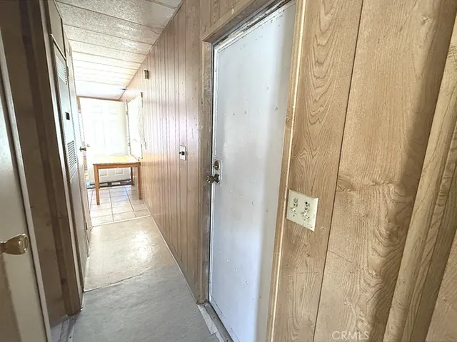 a view of a bathroom from the door