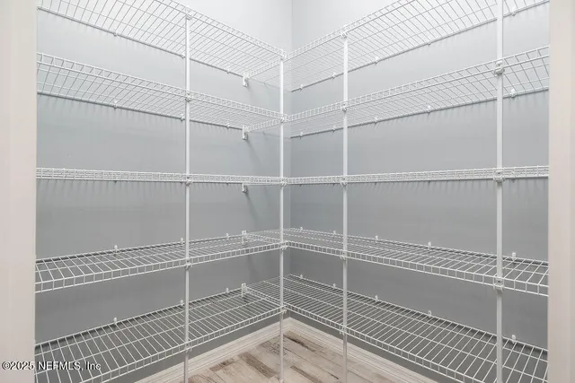 a view of a room with racks on the wall