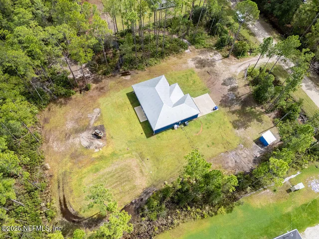 a view of swimming pool with a yard