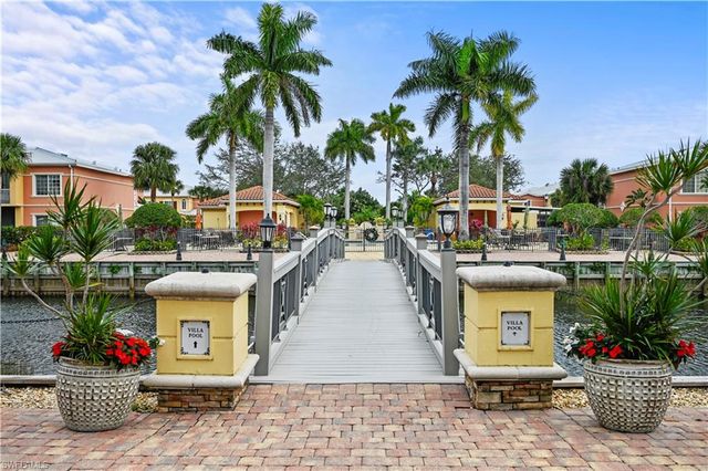 a view of multiple houses with a patio