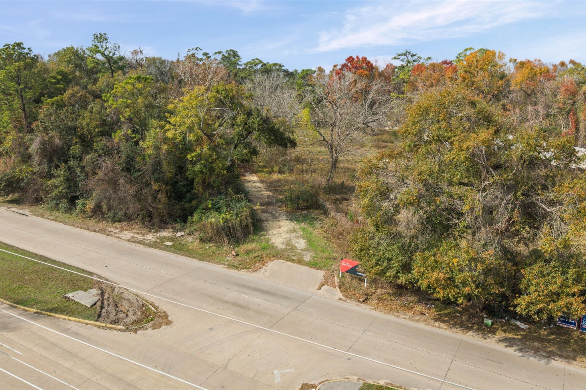 15313 Old Humble Road Humble, TX 77396 - Photo 6 of 6 a view of a pathway both side of building