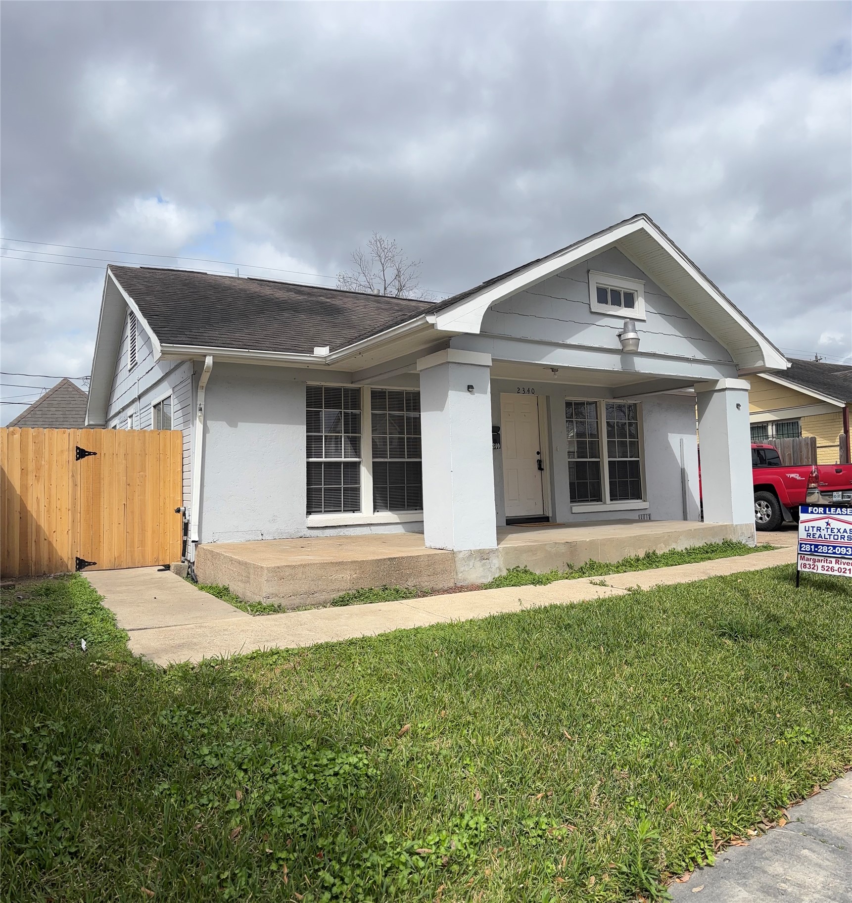 2340 Cumberland Street Houston, TX 77023 - Photo 1 of 18 front view of a house with a yard
