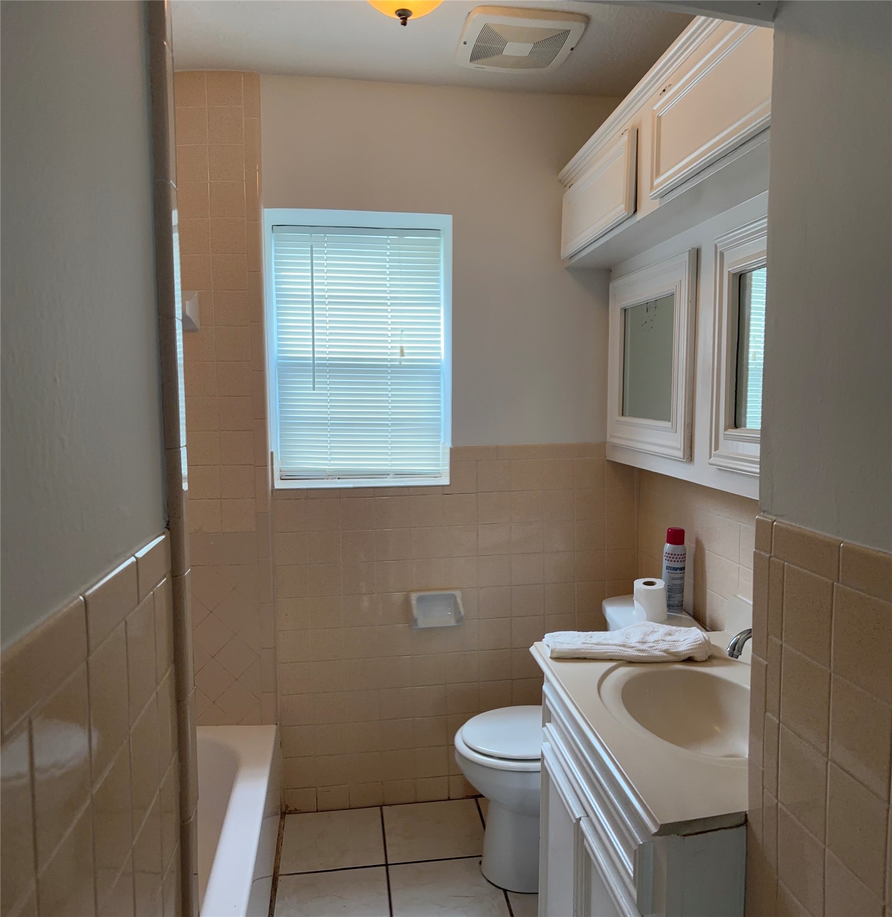 2340 Cumberland Street Houston, TX 77023 - Photo 12 of 18 a bathroom with a sink toilet and mirror