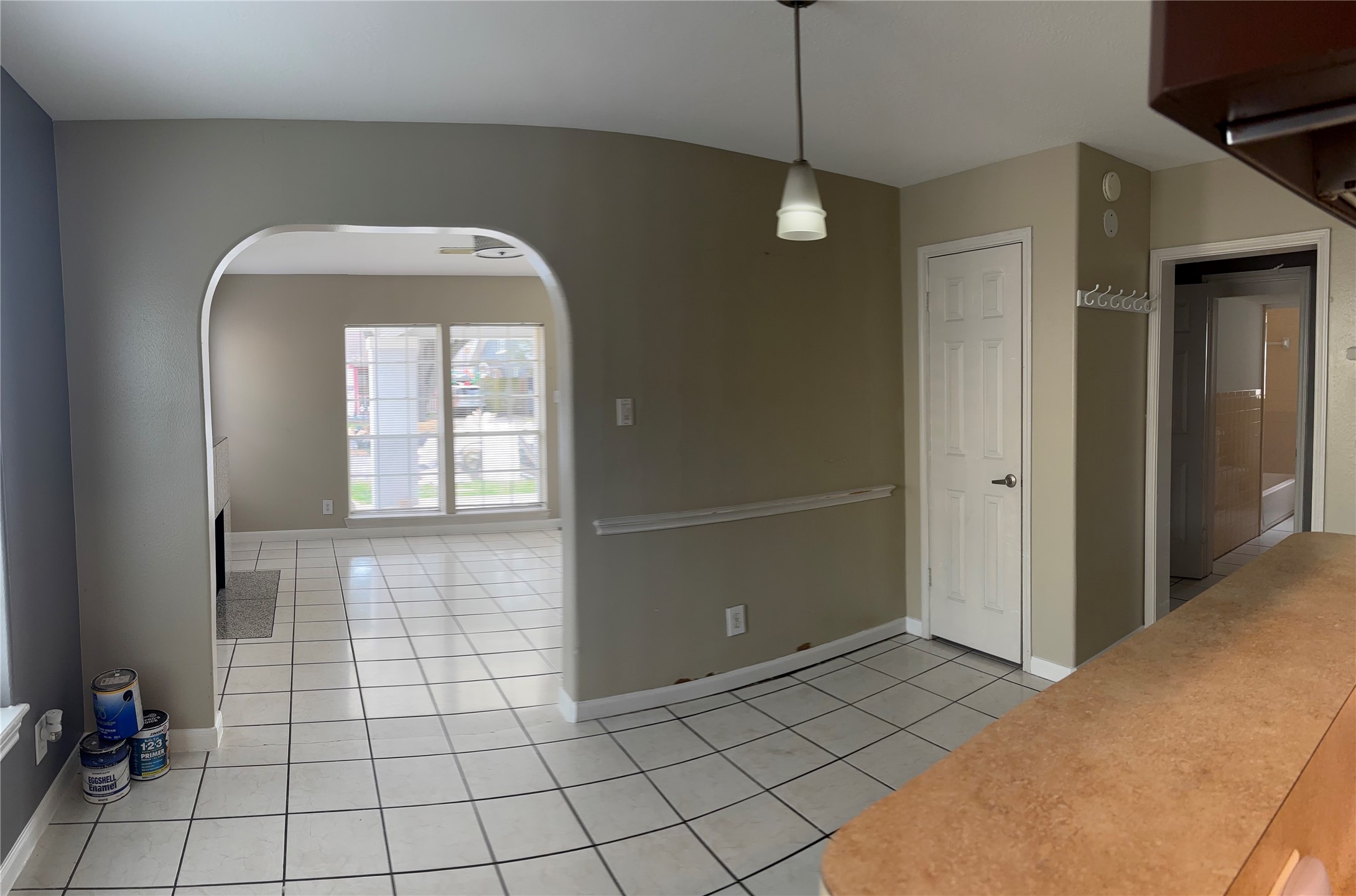 2340 Cumberland Street Houston, TX 77023 - Photo 10 of 18 a view of a hallway with a chandelier fan and glass door