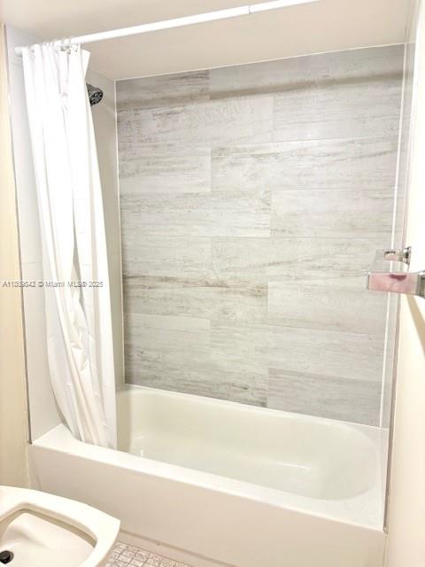 210 174th Street, Unit 818 Sunny Isles Beach, FL 33160 - Photo 12 of 25 a bathroom with a bathtub and shower