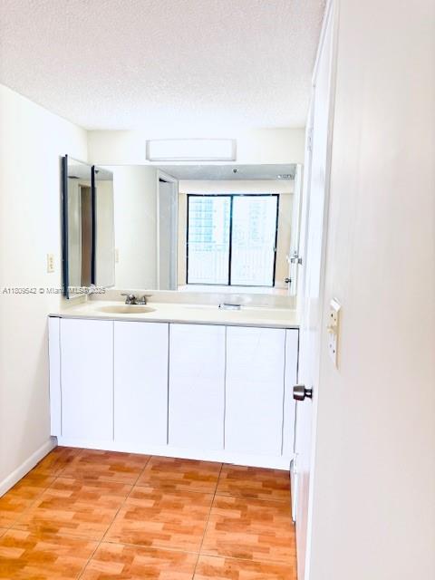 210 174th Street, Unit 818 Sunny Isles Beach, FL 33160 - Photo 15 of 25 a view of kitchen with granite countertop window and a sink