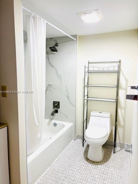 210 174th Street, Unit 818 Sunny Isles Beach, FL 33160 - Photo 16 of 25 a bathroom with a toilet and a shower