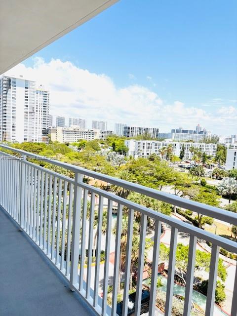 210 174th Street, Unit 818 Sunny Isles Beach, FL 33160 - Photo 4 of 25 a city view from a balcony