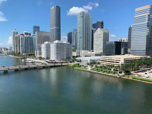 a view of a city with tall buildings
