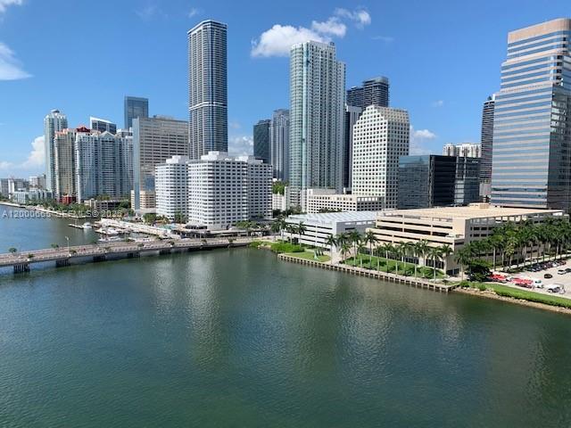 701 Brickell Key Boulevard, Unit 1501 Miami, FL 33131 - Photo 1 of 8 a view of a city with tall buildings