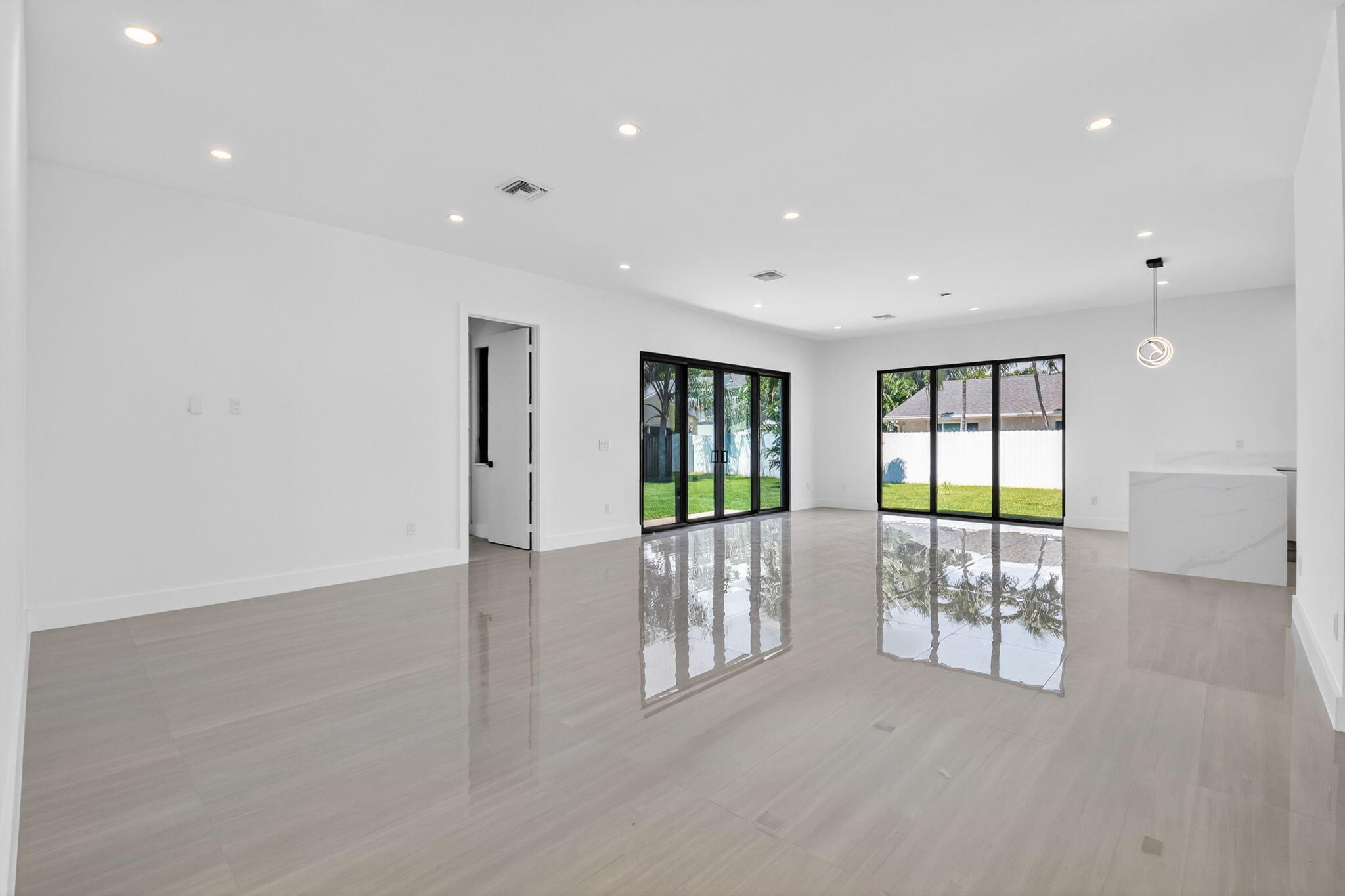 3920 Espan Court Palm Springs, FL 33461 - Photo 11 of 51 a view of an empty room with window