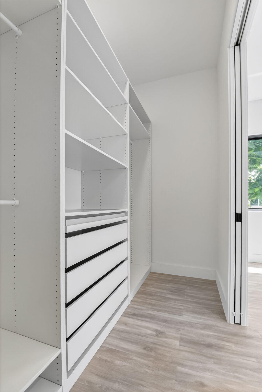 3920 Espan Court Palm Springs, FL 33461 - Photo 23 of 51 a view of an empty walk in closet