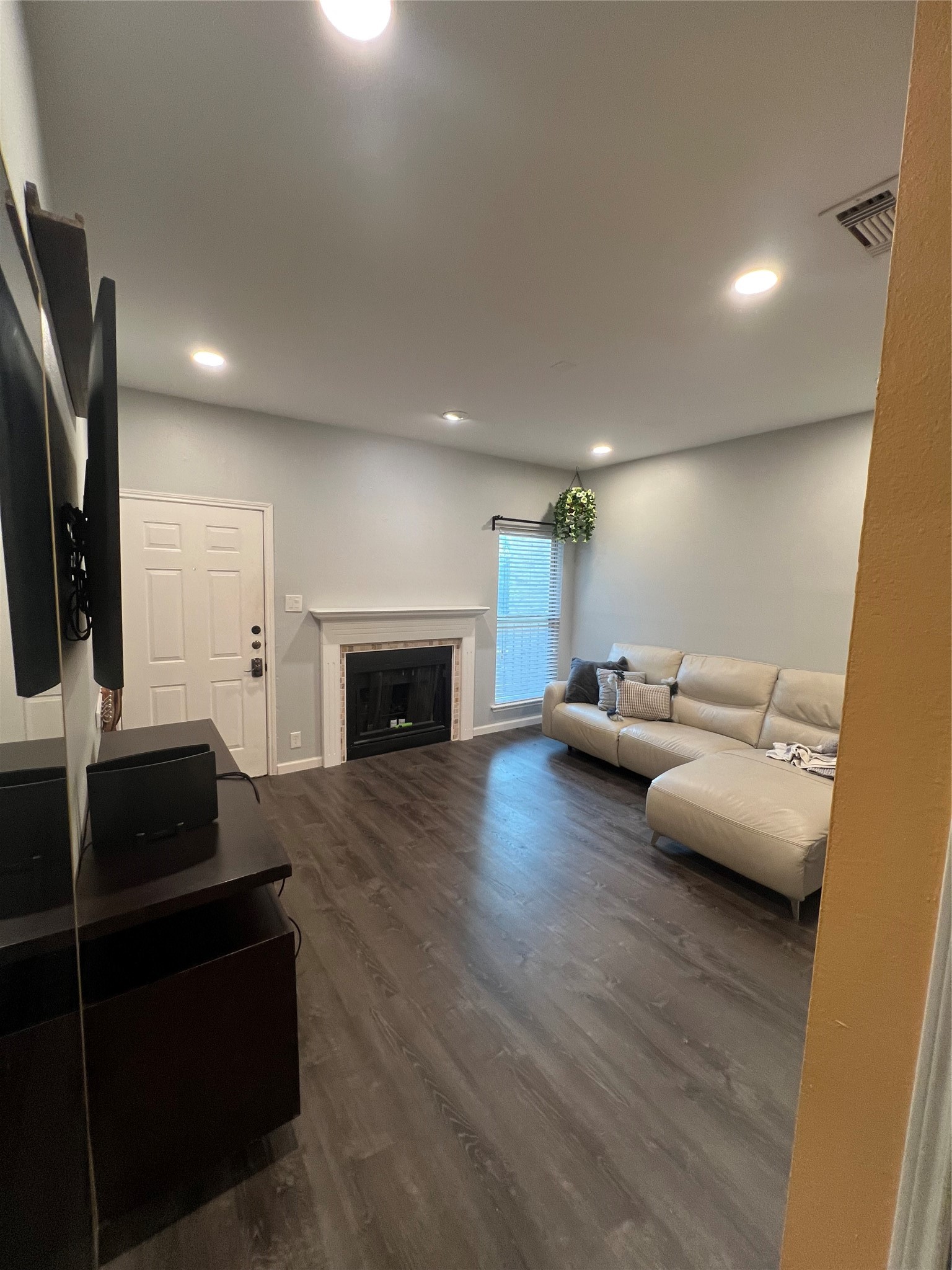 2414 Longview Street, Unit 202 Austin, TX 78705 - Photo 4 of 17 a living room with furniture and a fireplace